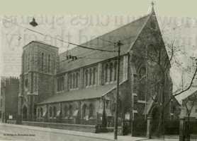 The church (before railings removed during the last War)